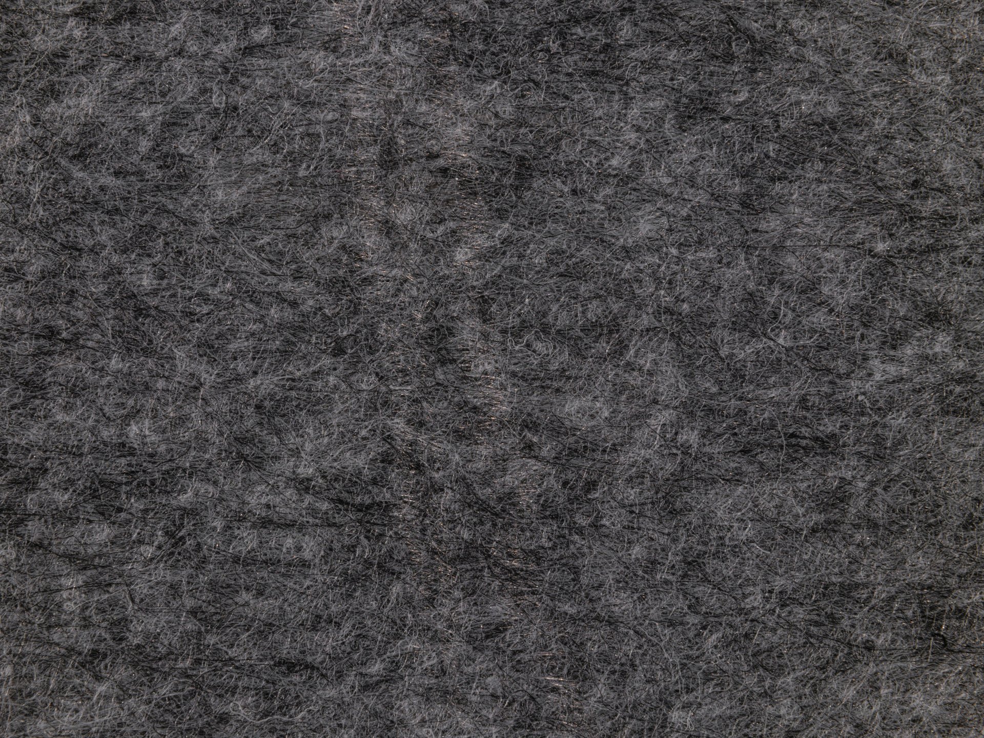 Gray nonwoven insulation fabric close-up — representative image